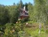 The Lodge from the garden  » Click to zoom ->